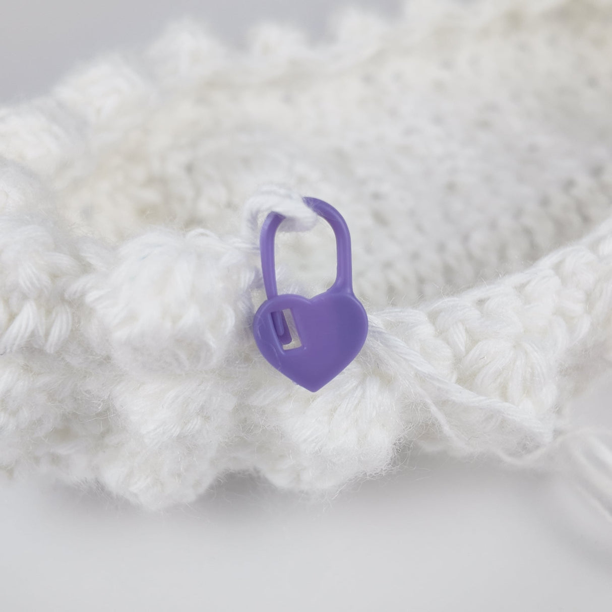 Sydämenmuotoiset ommelmerkit