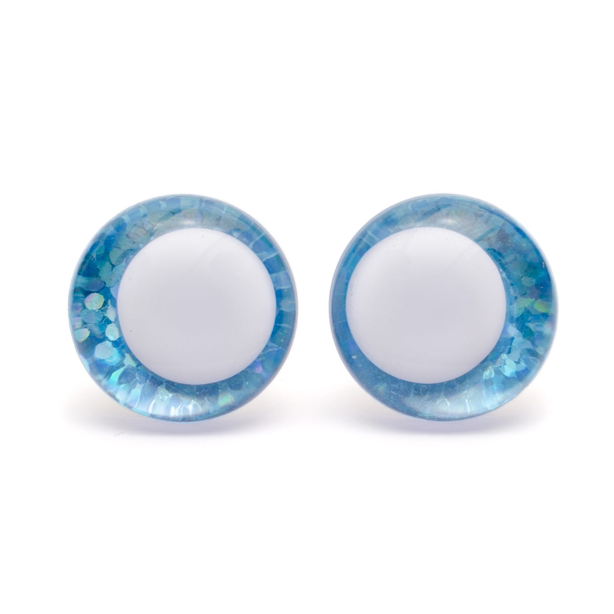 Ei keskikohtaa, turvasilmä, valkoinen pupilli - vaaleansininen